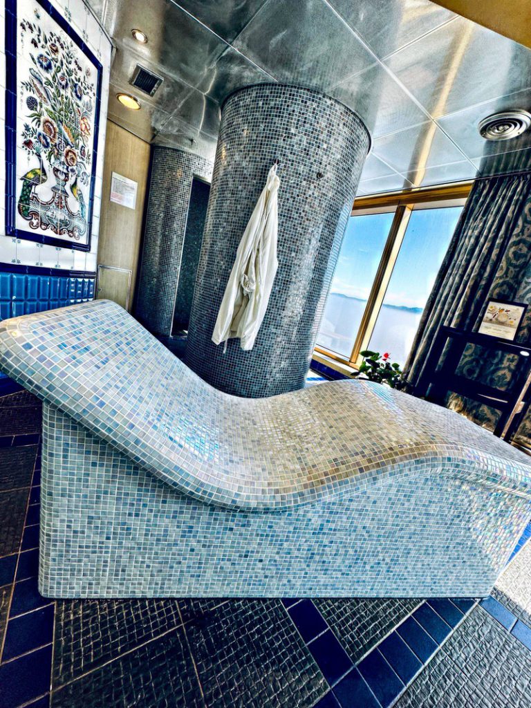 Instant relaxation at the Greenhouse Spa heated thermal lounge seats with an ocean view. Holland America Cruise.